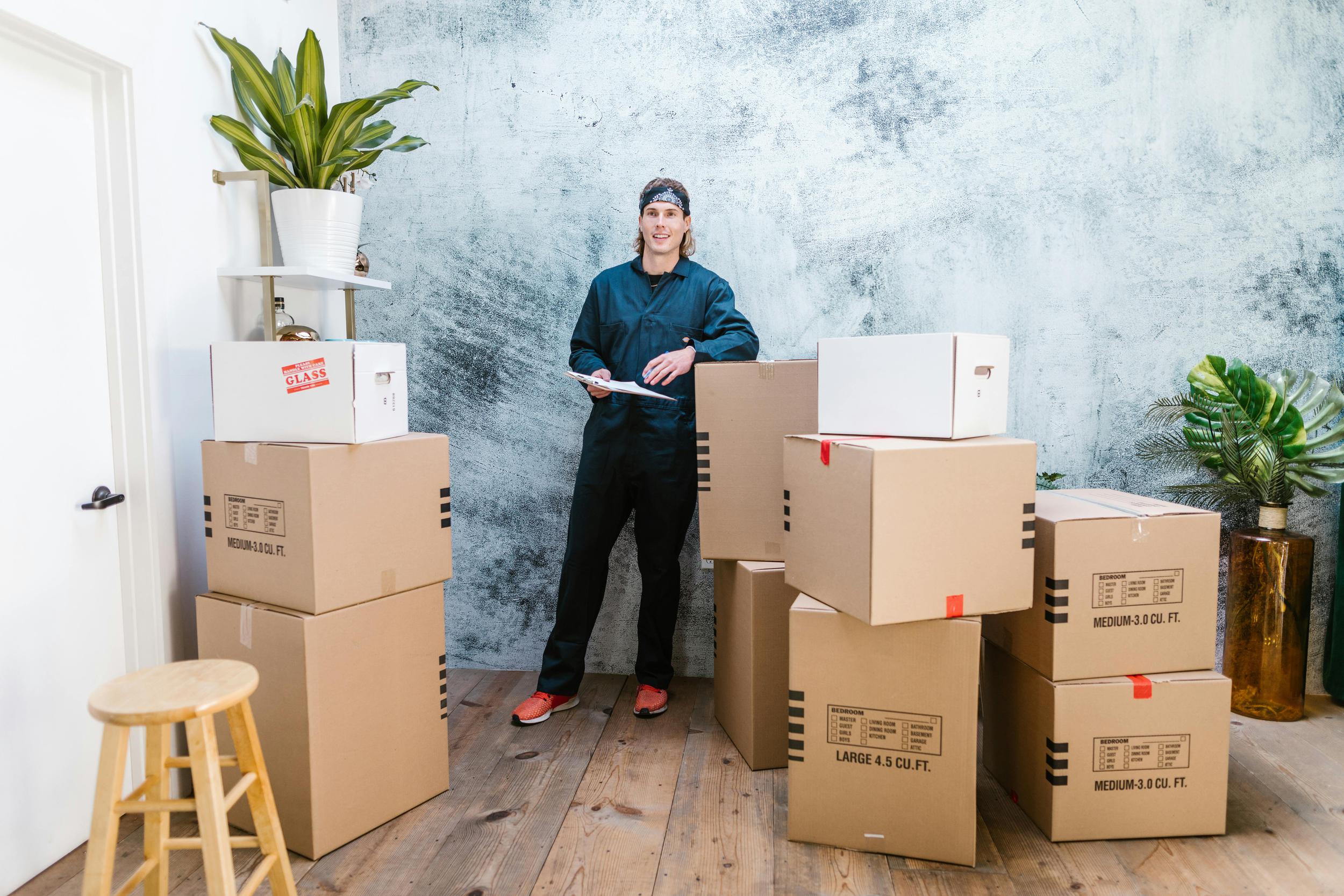 Moving boxes and worker